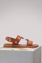 Flat leather sandals with eyelets 