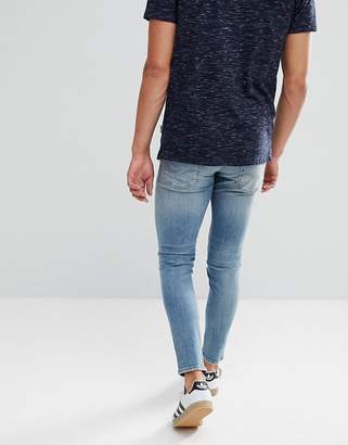 Jack and Jones Intelligence Jeans In Skinny Fit with Distress and Zip Ankle