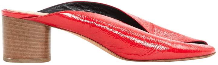 red patent leather clogs