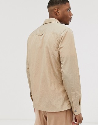 ASOS DESIGN zip through overshirt in sand with utility pockets