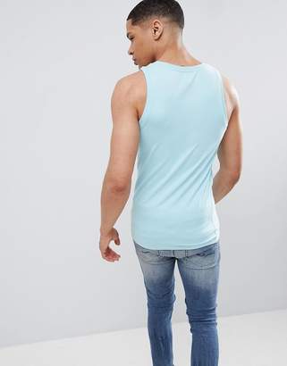 ASOS DESIGN muscle fit tank in green