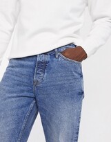 Thumbnail for your product : Topman relaxed jeans in mid wash