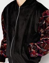 Thumbnail for your product : Reclaimed Vintage Bomber Jacket With Velvet Patterned Sleeves