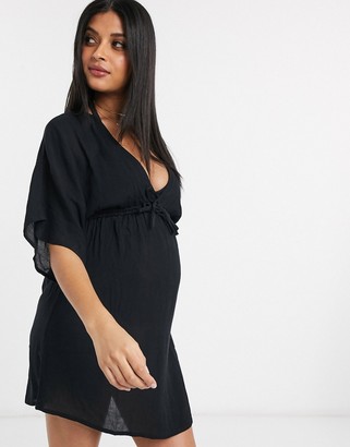 ASOS DESIGN MATERNITY crinkle beach cover up with channel waist & drape sleeves in black