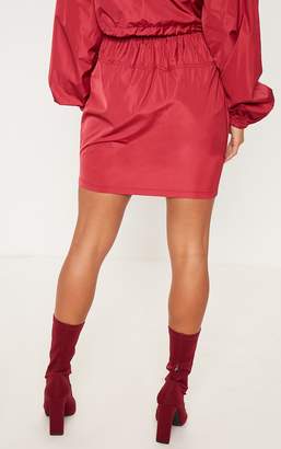 PrettyLittleThing Petite Burgundy Shell Suit Mini Skirt