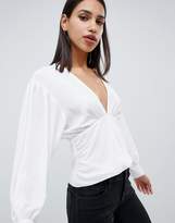 Thumbnail for your product : ASOS DESIGN v neck blouse with volume sleeve