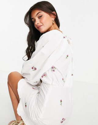 ASOS DESIGN cotton poplin wrap front mini dress with all over embroidery in white