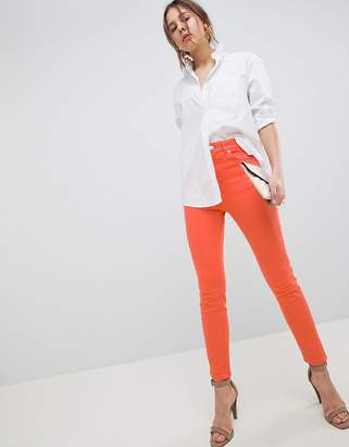 ASOS DESIGN Farleigh high waisted slim mom jeans in neon orange with contrast stitch