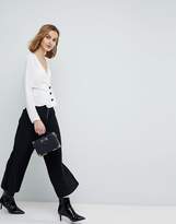 Thumbnail for your product : ASOS Design Wrap Top With Contrast Button Detail