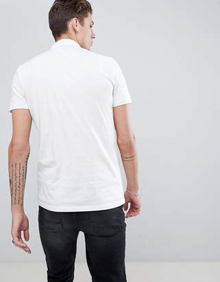 ASOS DESIGN Tall polo shirt with western piping in white