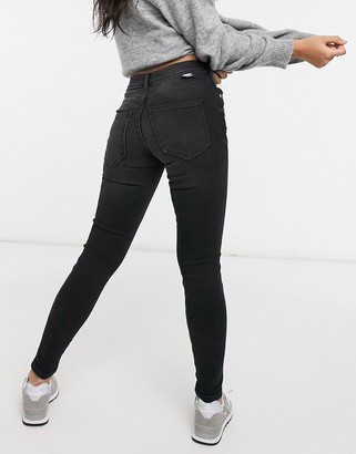 Dr Denim Petite Lexy skinny jeans with rips in black - ShopStyle