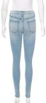 Thumbnail for your product : Thomas Wylde Mid-Rise Acid Wash Jeans