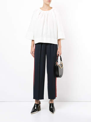 ASTRAET cropped trousers with red stripe