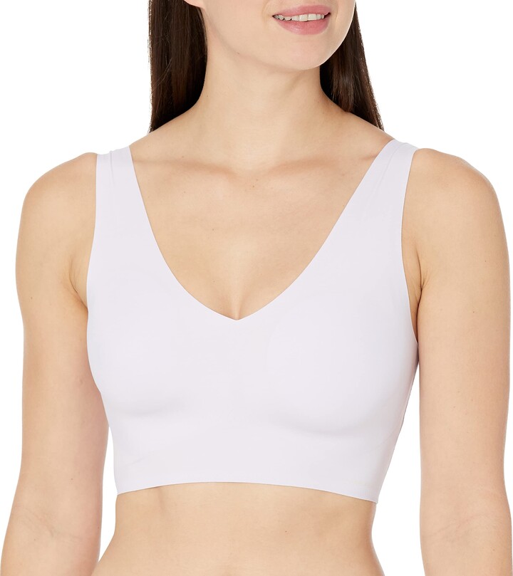 Buy Calvin Klein Women's Invisibles Comfort Seamless Lightly Lined V Neck Bralette  Bra, Nymph's Thigh, Large at