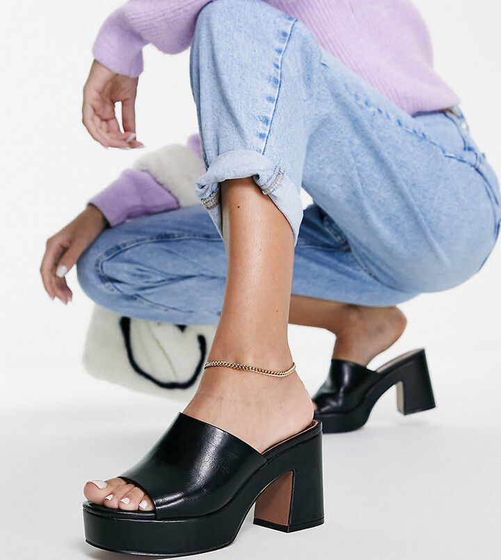 ASOS DESIGN Wide Fit Harmony mid heeled platform mules in black - ShopStyle