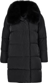 Puffer jacket with a fox fur collar