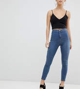 Thumbnail for your product : ASOS Petite DESIGN Petite Rivington high waist denim jeggings in mid blue wash with star bum detail