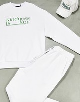 Thumbnail for your product : ASOS DESIGN oversized tracksuit with kindness chest print