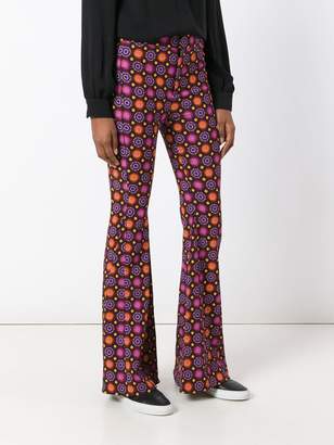 Givenchy psychedelic print flared trousers