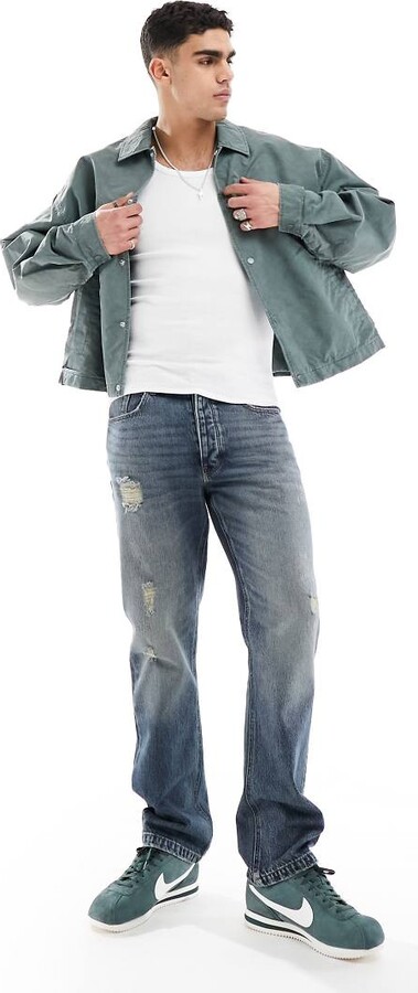 ASOS DESIGN classic rigid jeans in light wash with abrasions