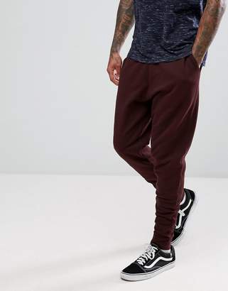 ASOS Tapered Joggers In Burgundy