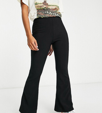 New Look Petite ribbed flare leggings in black - ShopStyle
