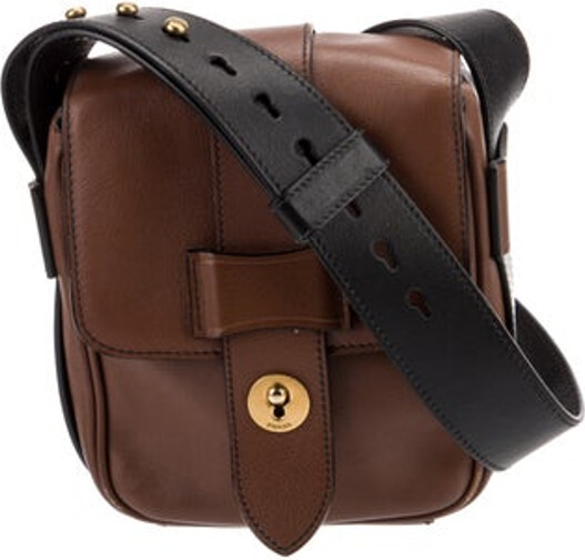 Prada Messenger Bag Brown City Calf Leather Antiqued Gold-Tone Hardware Single Adjustable Shoulder Strap Logo Jacquard Lining & Single Interior Pocket Flap Closure at Front Unfortunately, due to restrictions, this item may not be eligible for shipping in all areas.