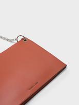 Thumbnail for your product : Charles & Keith Grommet Flat Clutch