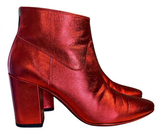 red metallic boots