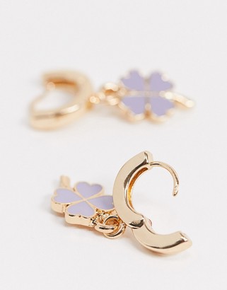 ASOS DESIGN hoop earrings with four leaf clover charm in gold tone