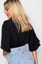 Thumbnail for your product : boohoo Petite Angel Sleeve Twist Woven Crop