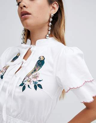 Fashion Union Tea Romper With Tie Neck And Parrot Embroidery