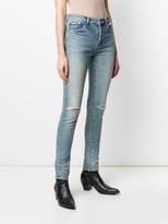 Thumbnail for your product : Saint Laurent High Rise Ripped Knee Jeans