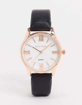 Bellfield watch with black strap and rose gold dial