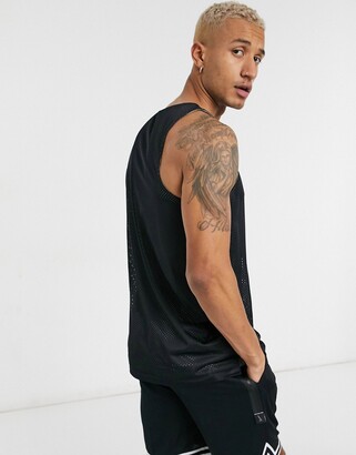 Nike Basketball standard issue reversible tank top in black - ShopStyle  Shirts