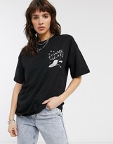 Thumbnail for your product : ASOS DESIGN oversized t-shirt with cosmic collage mono print