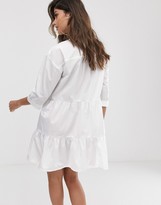 Thumbnail for your product : ASOS DESIGN button through tiered mini smock dress in white