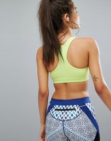 Thumbnail for your product : Puma Powershape Medium Support Racer Back Sports Bra In Neon Yellow
