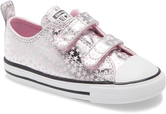 grey and pink ladies converse