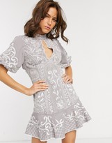 Thumbnail for your product : ASOS DESIGN DESIGN embroidered mini dress with keyhole and pep hem