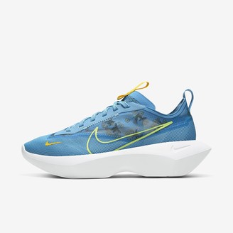 blue yellow and white nike shoes