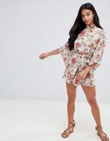 Thumbnail for your product : Sisters Of The Tribe Petite high neck playsuit with cut out back detail