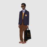 Thumbnail for your product : Gucci Striped cotton jacket with patch