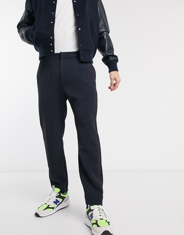 Weekday Mard tapered trousers in navy ShopStyle