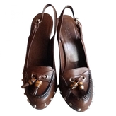 Thumbnail for your product : Gucci Camel Leather Mules & Clogs