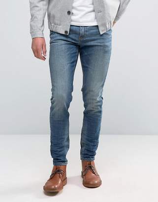 ASOS Design Skinny Jeans In 12.5oz Mid Blue