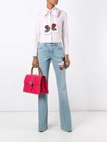 Thumbnail for your product : Gucci embroidered flared denim jeans