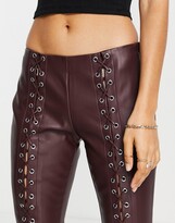 Thumbnail for your product : ASOS DESIGN ASOS DESIGN Petite leather look lace up flare trouser in plum