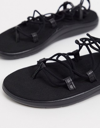 teva voya infinity lace up sandals in black