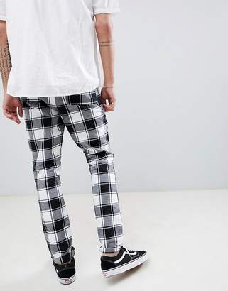 ASOS Design DESIGN Tall tapered pants in monochrome flannel check
